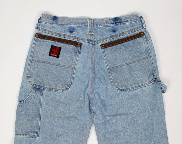 Wrangler RIGGS Workwear lichtblauwe jeans achterzakken en gereedschapszak